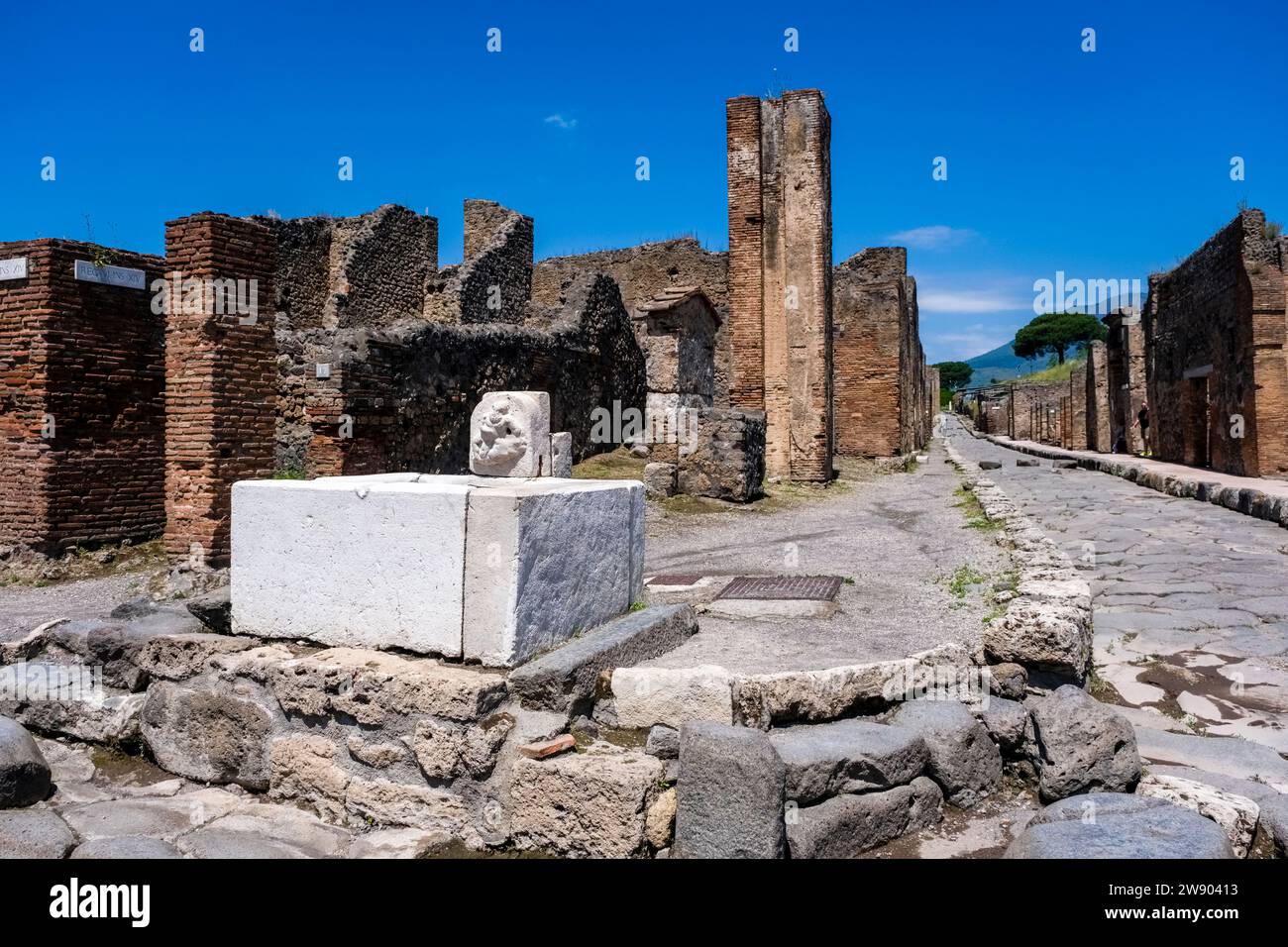 Ruins in Vicolo del Panettiere in the archaeological site of Pompeii, an ancient city destroyed by the eruption of Mount Vesuvius in 79 AD. Stock Photo