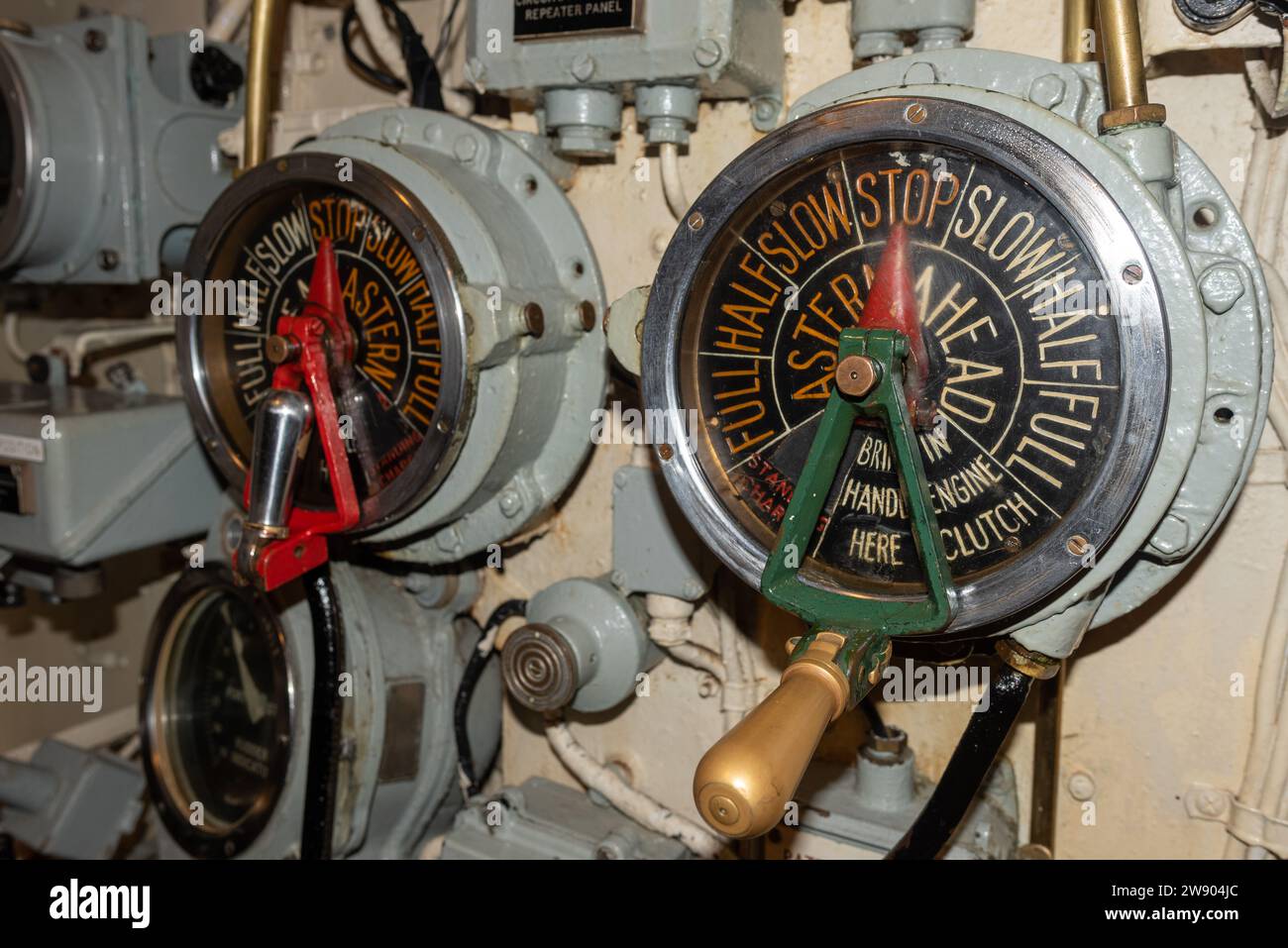 Interior mechanics and workings with various dials inside HMS Alliance, part of the submarine museum in Gosport, England. December 2023. Stock Photo