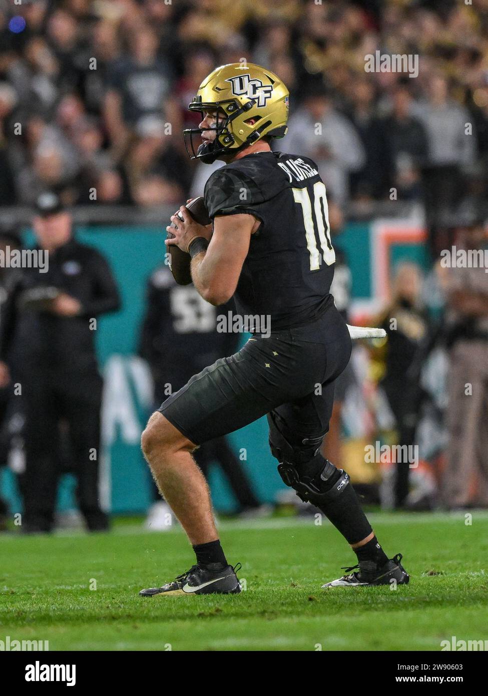 December 22, 2023 UCF quarterback John Rhys Plumlee (10) looks for a