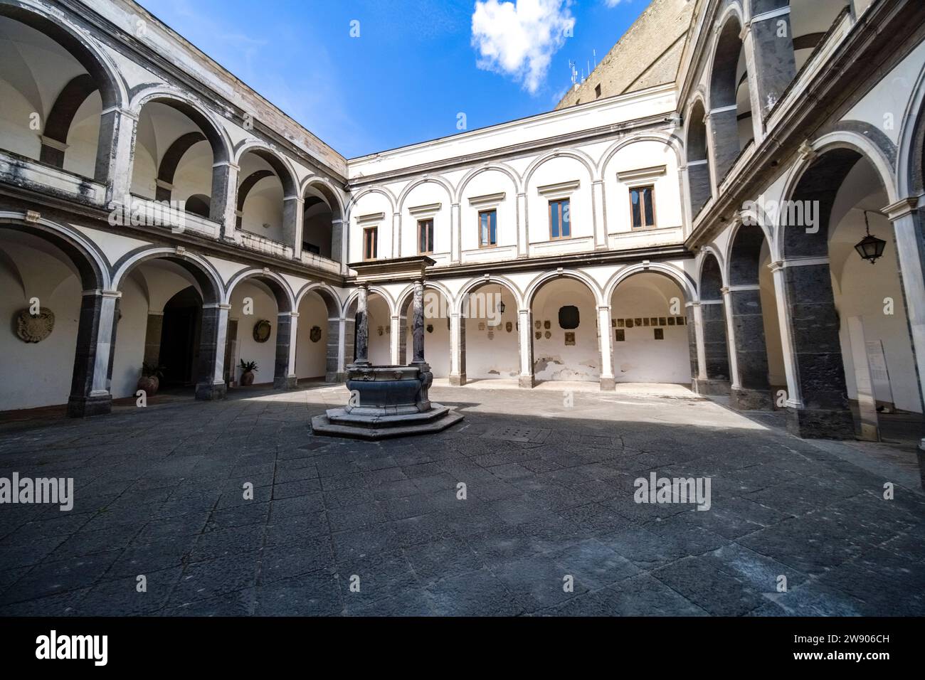 Small inner courtyard and cloister of the former Carthusian monastery Certosa di San Martino, situated on a hill high above the town. Stock Photo