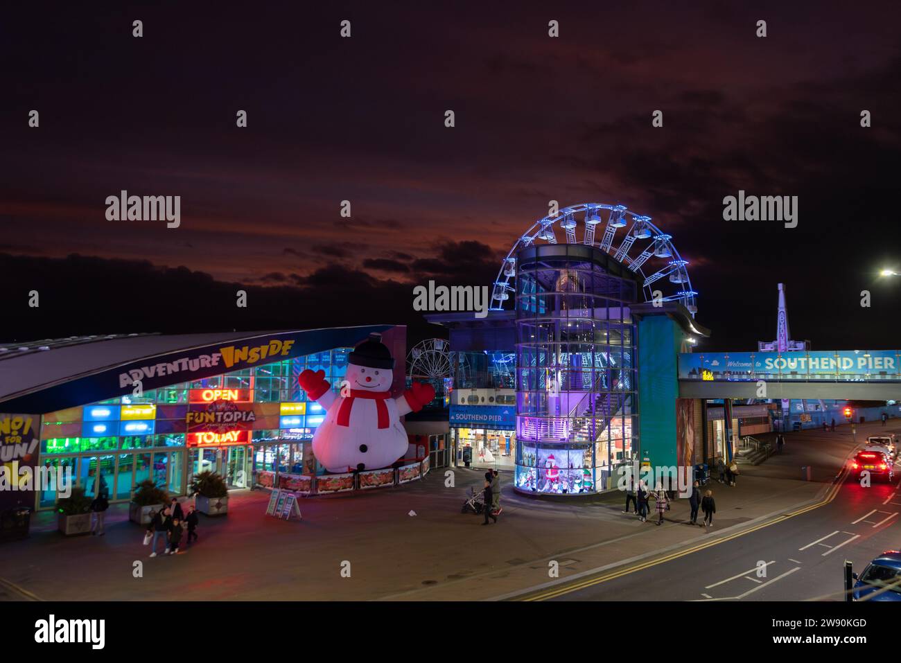 Adventure Island inside, entertainment venue on Southend on Sea seafront at Christmas with large snowman. Pier entrance and pleasure park big wheel Stock Photo