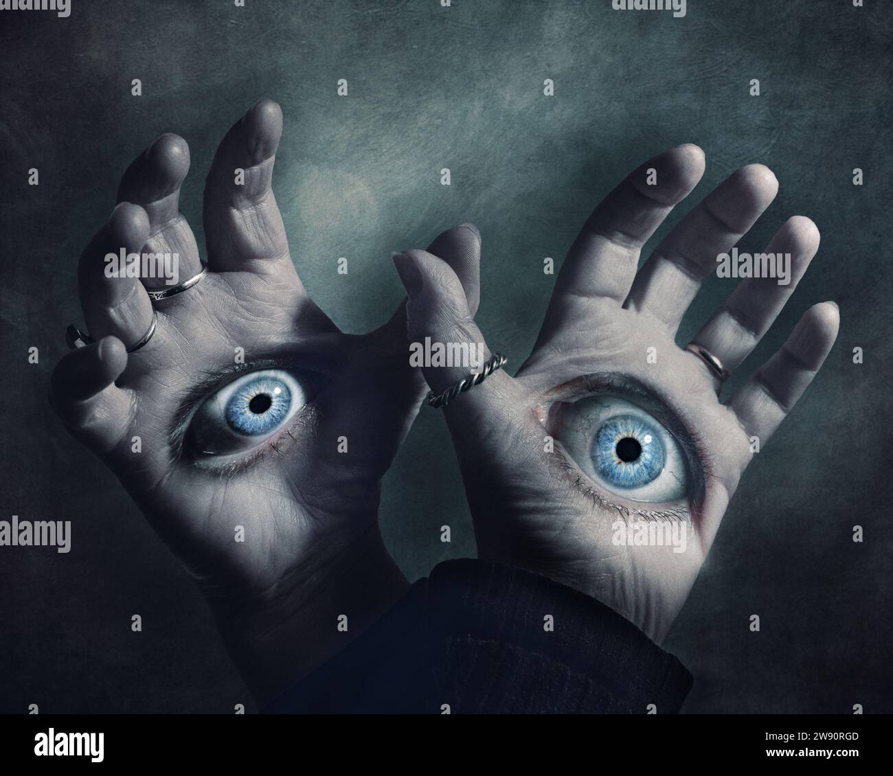 caught your eye, composite photograph featuring a eyes on the palms of