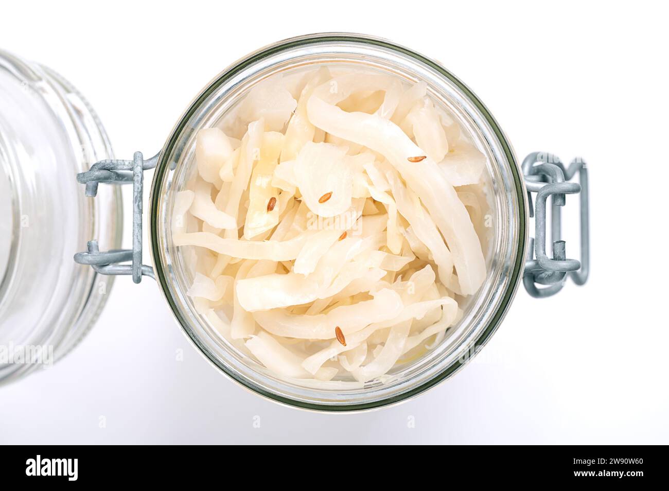 German sauerkraut, in an opened swing top glass jar. Cut raw cabbage