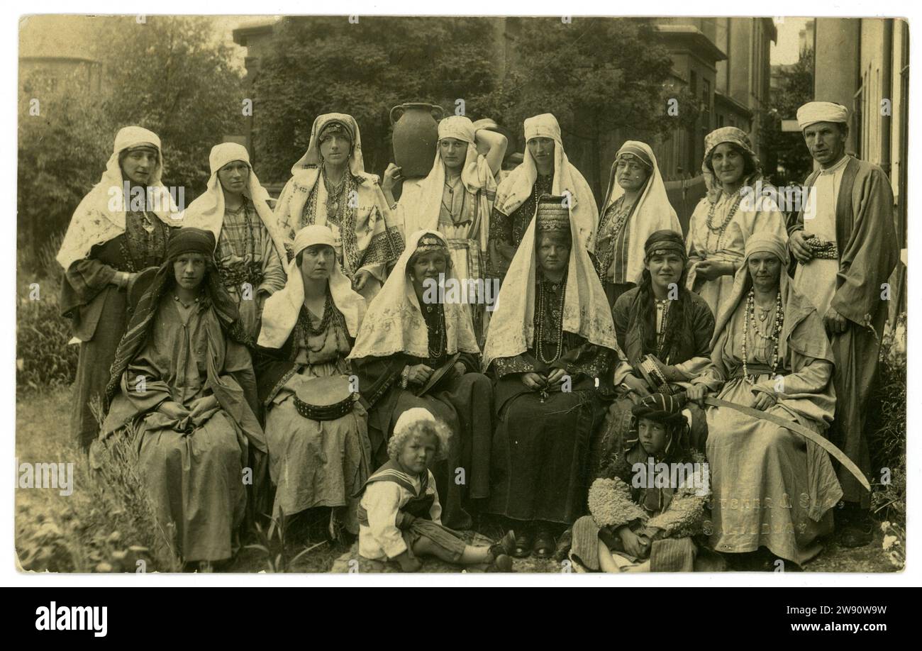 Original 1920's  postcard of St. Paul's church group in fancy dress, on a religious theme. Men and women wearing traditional Palestinian costume. Written on reverse is St Paul's Fisherton, Salisbury. Postcard from the photographer Frederick Futcher and son Salisbury. Circa 1925 Stock Photo