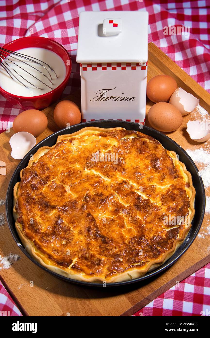 Quiche Lorraine homemade in a traditional look with 'Flour' lettering Stock Photo