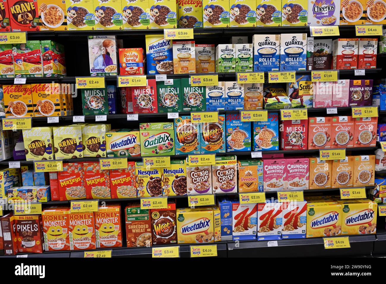 Variety of cereal boxes on supermarket shelves Stock Photo