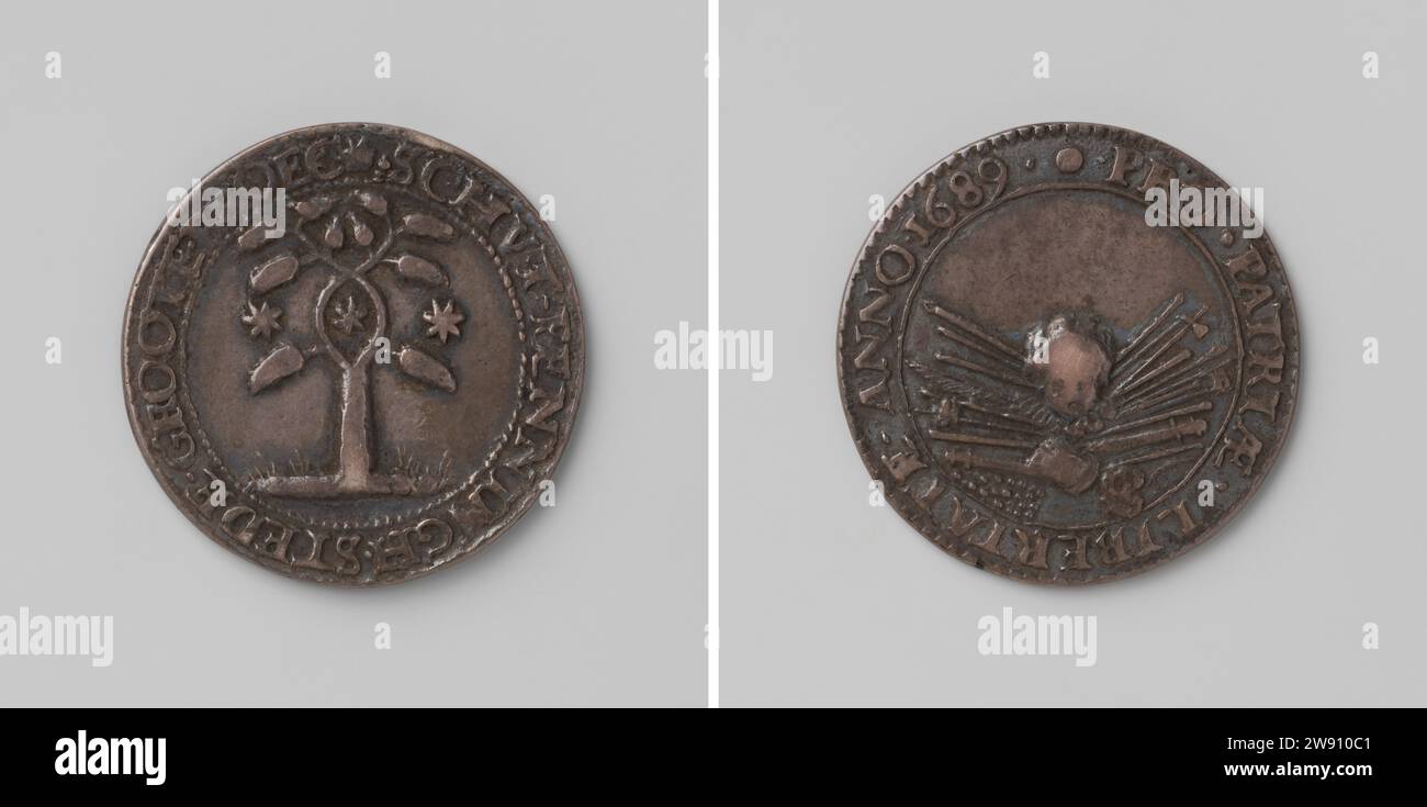 Schutterij van Grootebroek, Anonymous, 1689  Silver medal. Front: tree with branches braided; in Elips star formed by branches; On either side of it: stars within Kerschrift. Reverse: head in the pipeline Wapentuit within Covering Grootebroek silver (metal) striking (metalworking)  Grootebroek Stock Photo