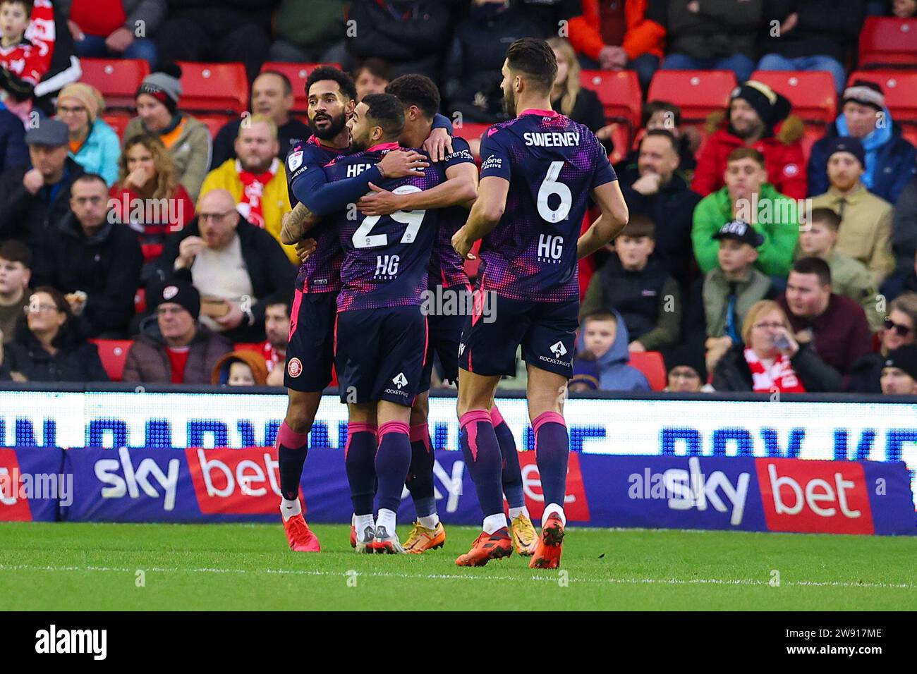 Stevenage players celebrate their opening goal during the Sky Bet League 1  match Barnsley vs Stevenage at Oakwell, Barnsley, United Kingdom, 23rd  December 2023 (Photo by Ryan Crockett/News Images Stock Photo - Alamy