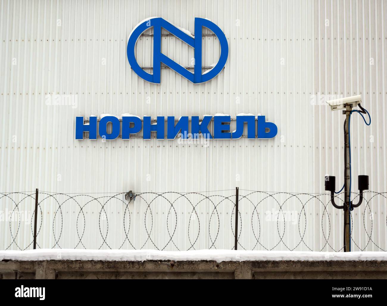 Voronezh, Russia - February 27, 2022: Norilsk Nickel company logo against the background of technical security equipment Stock Photo