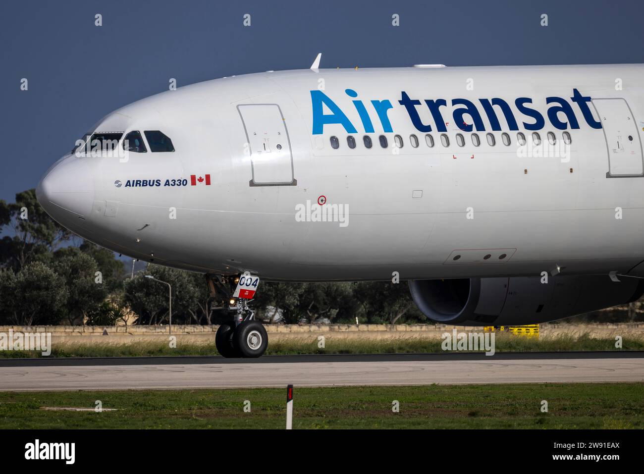 Air Transat Airbus A330-343 (REG: C-GTSD) departing Malta after 3 months of maintenance. Stock Photo