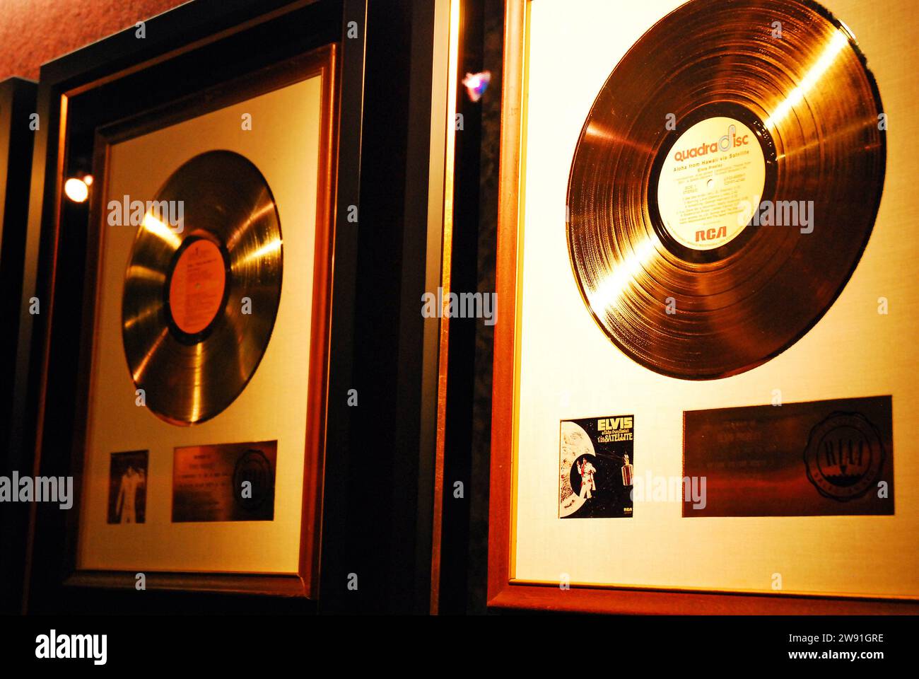 Gold records awarded to Elvis Presley for his album sales, hang on a wall at Graceland Stock Photo