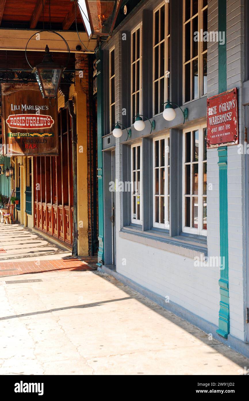 Storefronts in Pensacola Florida's historic Seville District offer restaurants cafes and boutique shops Stock Photo