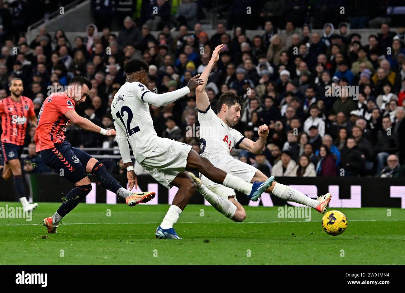 London, UK. 23rd Dec, 2023. Jack Harrison (Everton) has a shot as Emerson Royal (Tottenham, 12) and Ben Davies (Tottenham) try to block during the Tottenham V Everton Premier League match at the Tottenham Hotspur Stadium. Credit: MARTIN DALTON/Alamy Live News Stock Photo