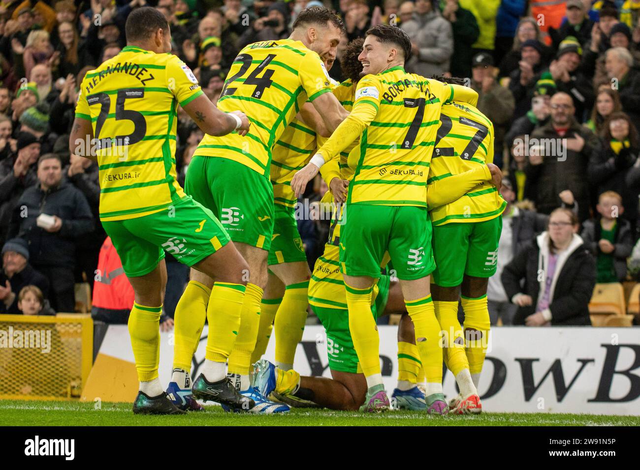 Norwich, UK. 23rd Dec 2023. Norwich City Sam McCallum (middle) with