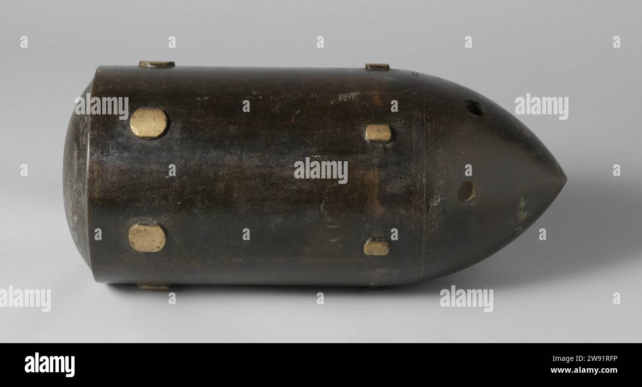 23-cm Steel Shell, Alderson (possibly), 1867 grenade (ammunition) Pointed 23 cm grenade. The grenade is 51.5 cm long and has a caliber of 226 mm. It is made up of two parts that are screwed together; This way the grenade could be provided with its spring load. The grenade has two rings of cams for a drawn run with six pulling fields, the bottom is bulb. At the nose three shallow holes for the ammunition tap. United Kingdom iron (metal). bronze (metal). brass (alloy) Stock Photo