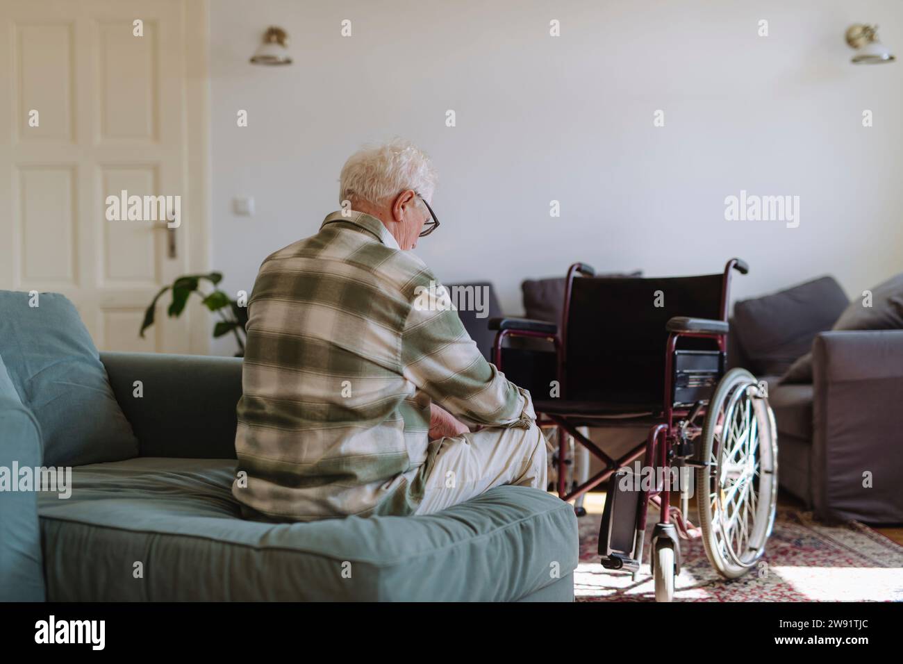 Old man wheelchair sad hi-res stock photography and images - Alamy