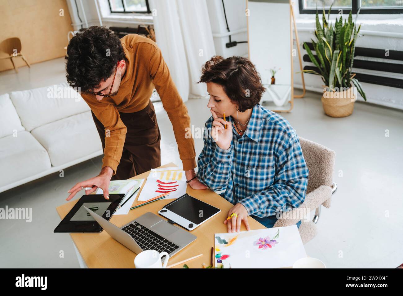 Young design illustrators planning together at office Stock Photo