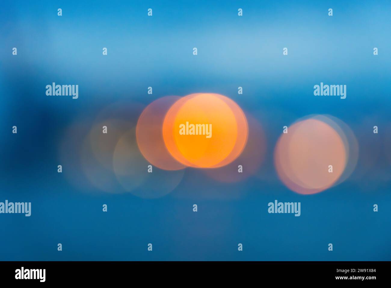Bokeh lights on blue background Stock Photo
