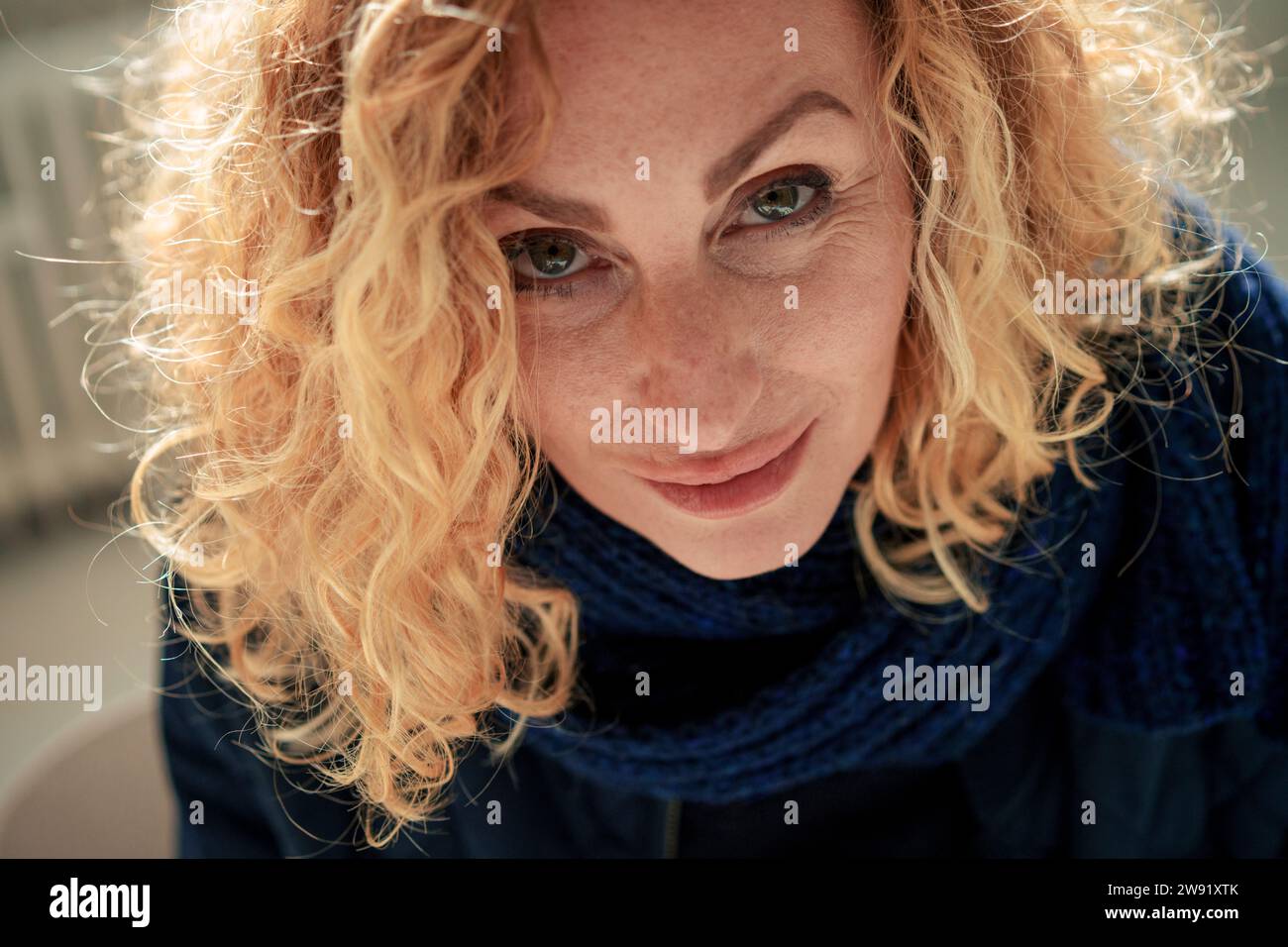 Mature woman blond curly hi-res stock photography and images - Alamy