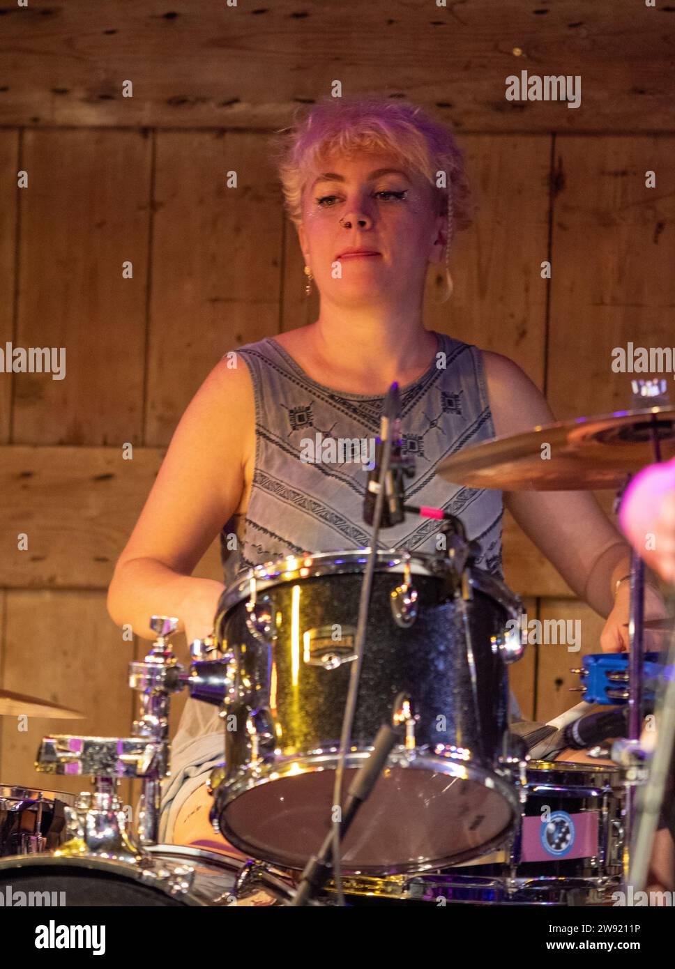 At the 2019 Maverick Americana festival a young woman kit drummer possibly playing with The Crux or Dana Immanuel & The Stolen Band or neither Stock Photo