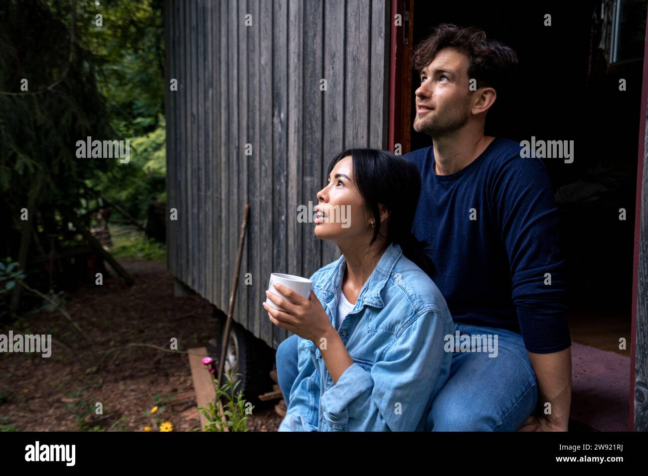 Asian woman man sitting hi-res stock photography and images - Alamy