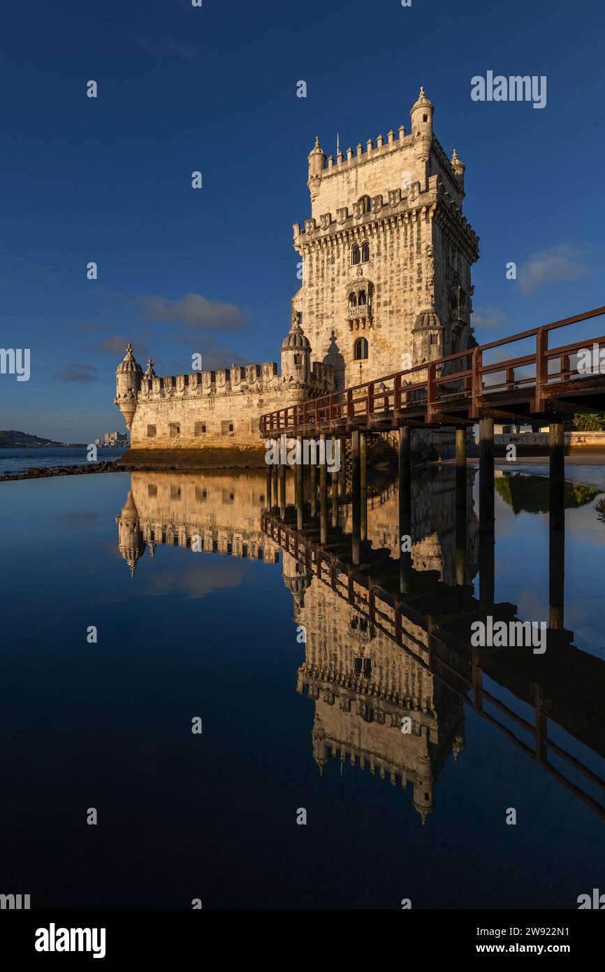 Portugal, Lisbon District, Lisbon, Belem tower reflecting in Tagus river at dusk Stock Photo
