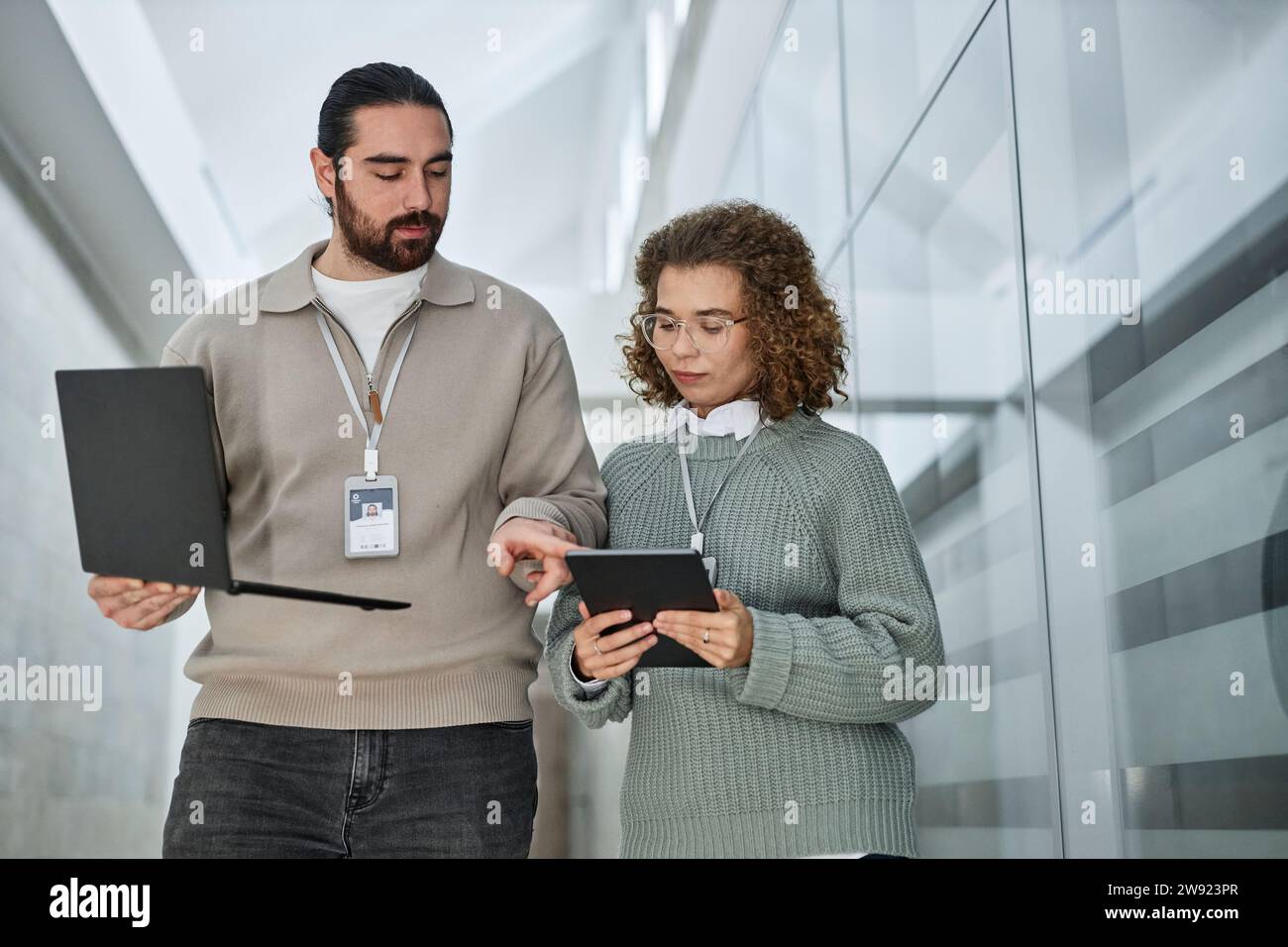 IT professionals discussing over tablet PC in office Stock Photo