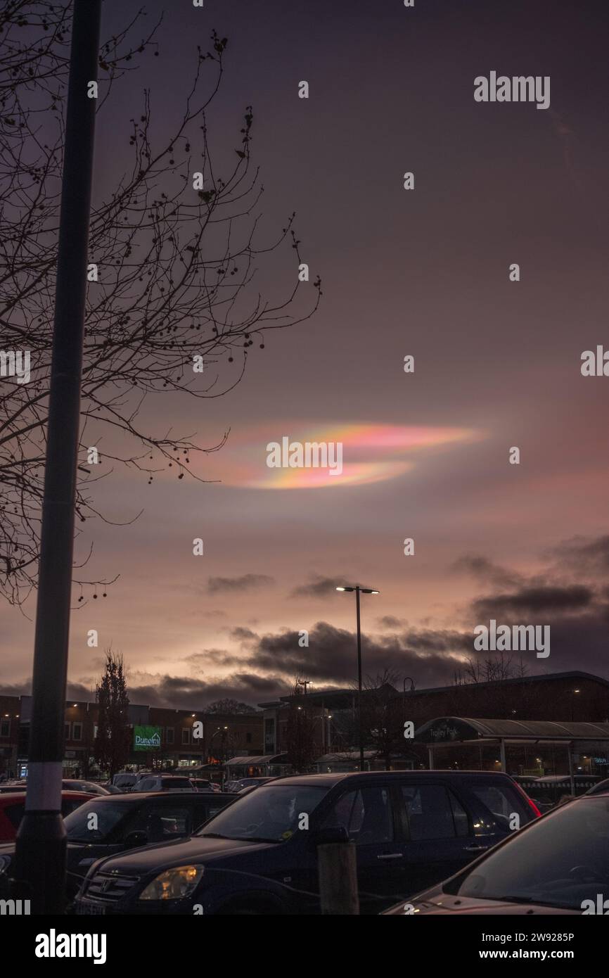 Didcot, England, Saturday 23rd December 2023, Rare Polar stratospheric clouds (PSCs) also known as nacreous clouds appear in the sky dramatically over Didcot Orchard Centre. Credit: Lu Parrott/ Alamy Live News Stock Photo