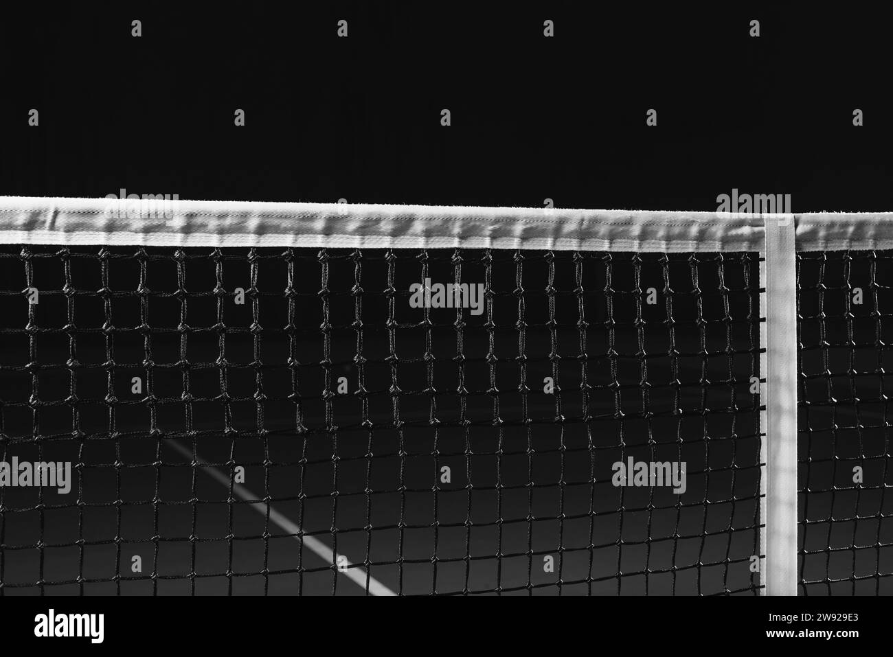 Image of a tennis court with a stretched net. Sports concept. Mixed