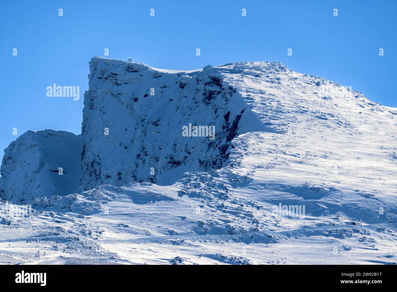 Snowy mountain, veleta peak 3394 meters high, in the betic mountain range, sierra nevada, andalucia, granada, spain Stock Photo