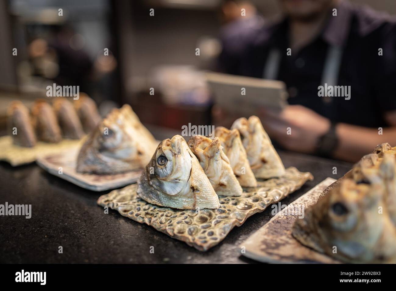 Pacu heads, preparation in the kitchen, Restaurante El Central, Lima ...