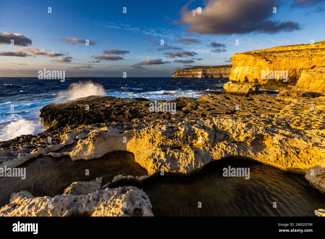 Sunset at the former rock gate Azure Window (Maltese Tieqa Żerqa, German Blaues Fenster) in the west of the Maltese island of Gozo on the coast off the village of San Lawrenz (Saint Lawrence), Malta Stock Photo