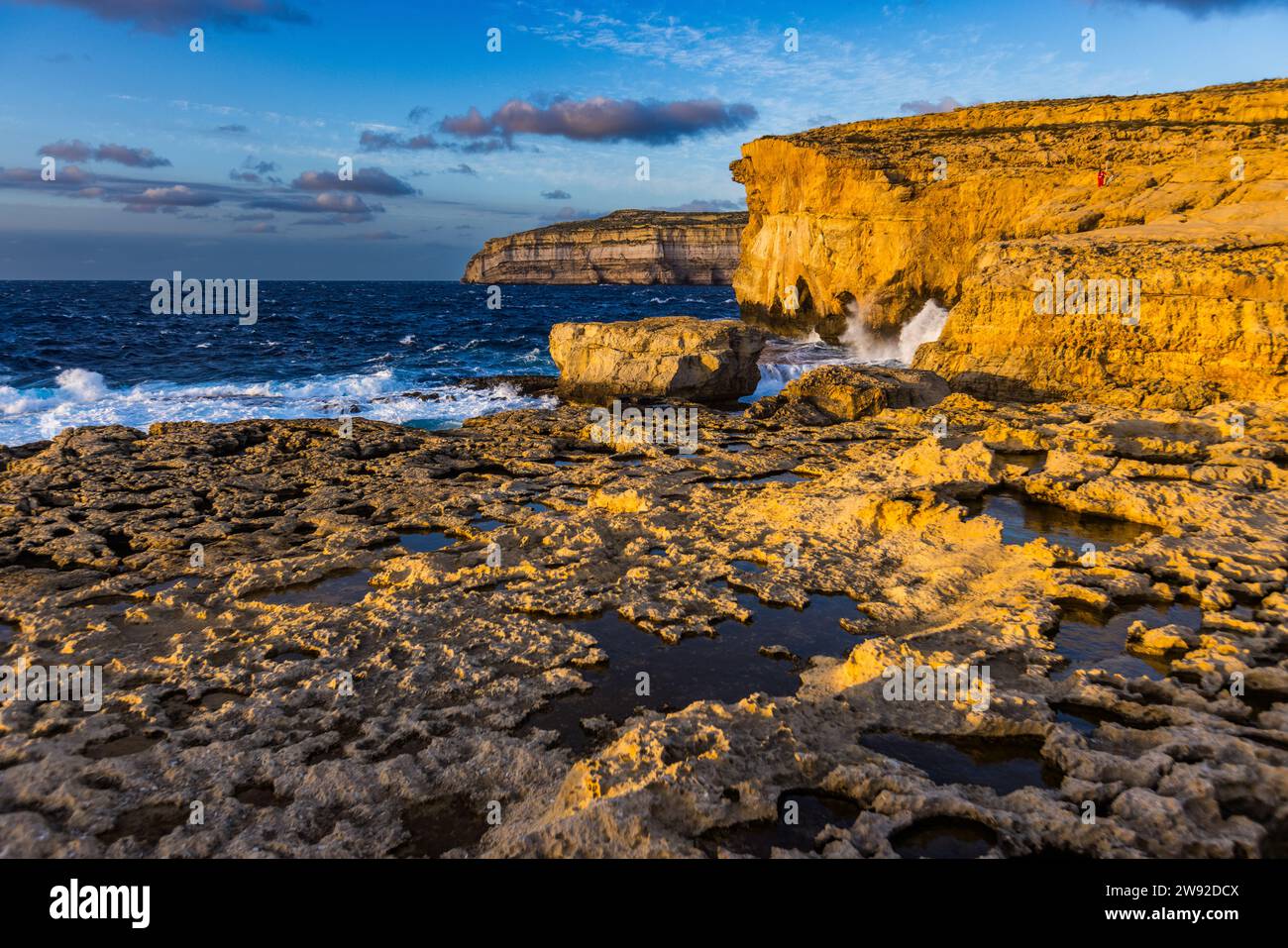 Sunset at the former rock gate Azure Window (Maltese Tieqa Żerqa, German Blaues Fenster) in the west of the Maltese island of Gozo on the coast off the village of San Lawrenz (Saint Lawrence), Malta Stock Photo