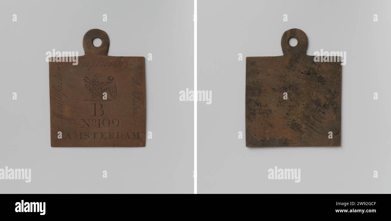 Manufacture Imperiale de Tabacs in Amsterdam, carrying sign, worn by one of the employees, with no. B 109, Anonymous, 1811 - 1813  One -sided copper square carrier sign to wear eye. Front: French eagle above letter B and inscription No. 109 Inside. Reverse: Blanco. Amsterdam copper (metal) engraving  Amsterdam Stock Photo