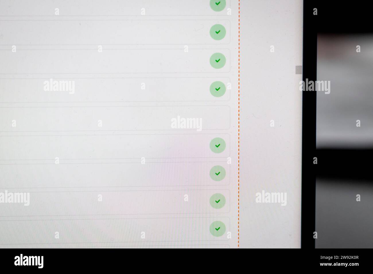 Close up shot of computer screen showing file upload progress Stock Photo