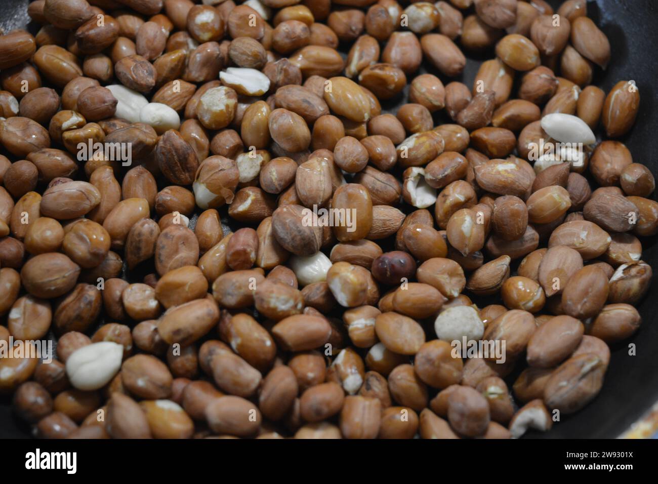 Fresh, roasted peanut pan, delicious and healthy nuts. Stock Photo