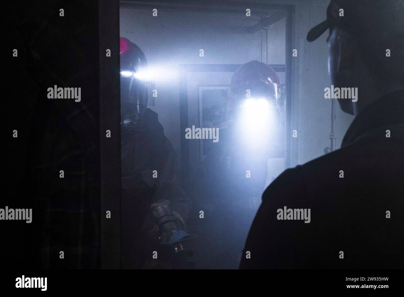 U.S. Navy Damage Controlman 2nd Class Dylan Ratliff, far right, leads ...