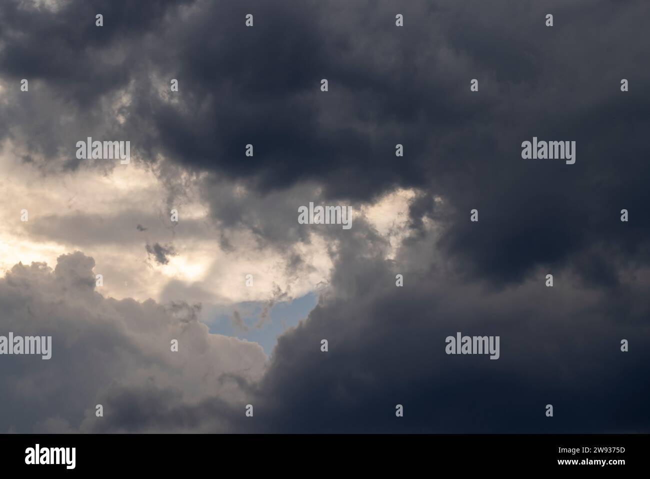 big dark clouds before rain, beautiful dramatic sky with dark clouds in ...