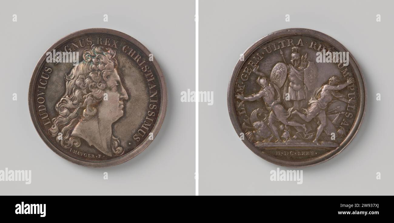 60,000 Germans over the Rhine hunted by the French, Jean Mauger, 1699 - 1703 history medal Silver medal. Front: breastpiece man inside change. Reverse: founded victory sign in the midst of stacking stress and two fleeing German warriors within Covering. Paris silver (metal) striking (metalworking)  Rhine. As acece Stock Photo