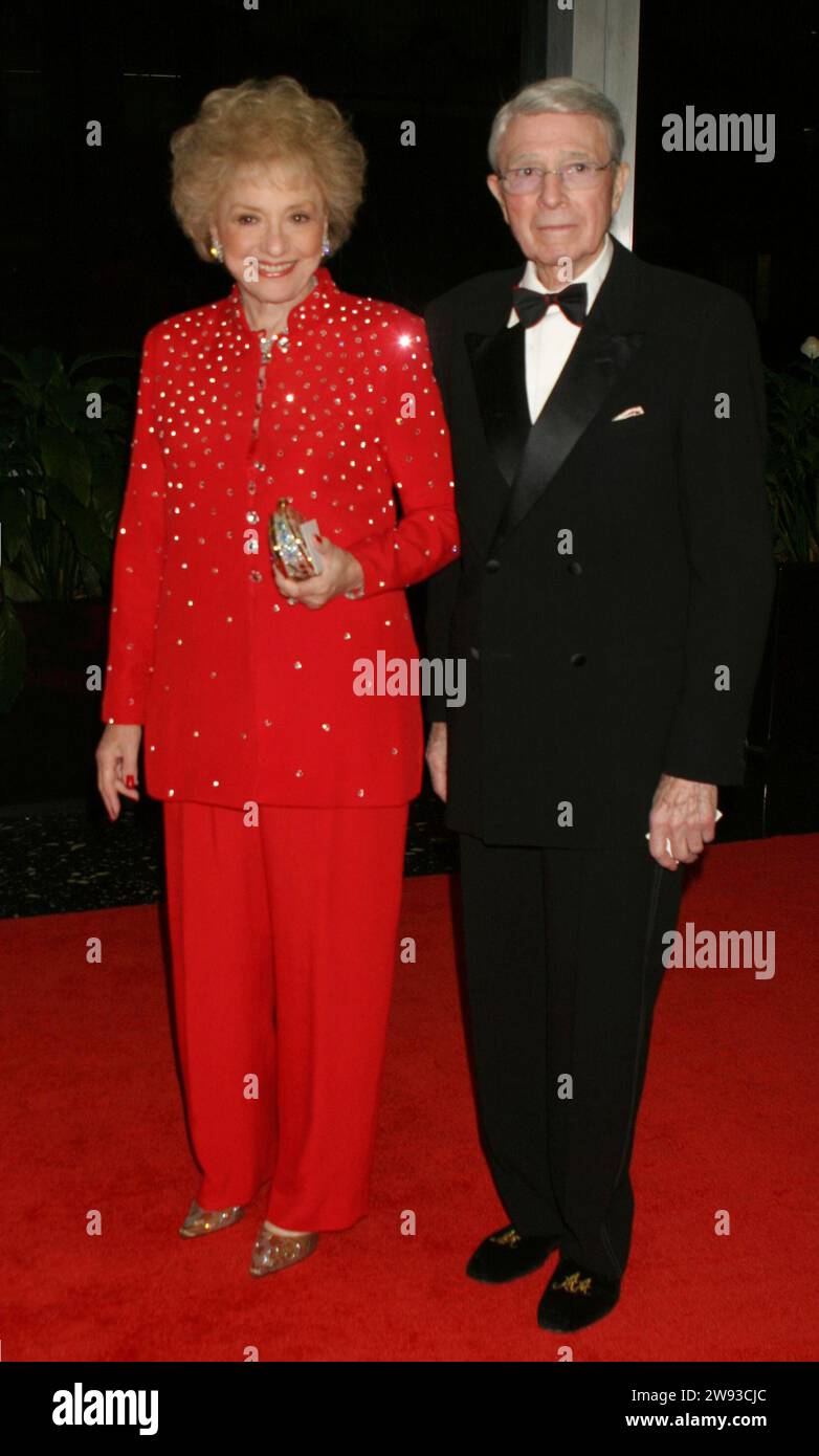 **FILE PHOTO** Selma Archerd Has Passed Away. Army Archerd and wife Selma Archerd attend the Kennedy Center Honors Trustees Dinner at the Department of State in Washington, DC on December 4, 2004. Photo Credit: Henry McGee/MediaPunch Credit: MediaPunch Inc/Alamy Live News Stock Photo