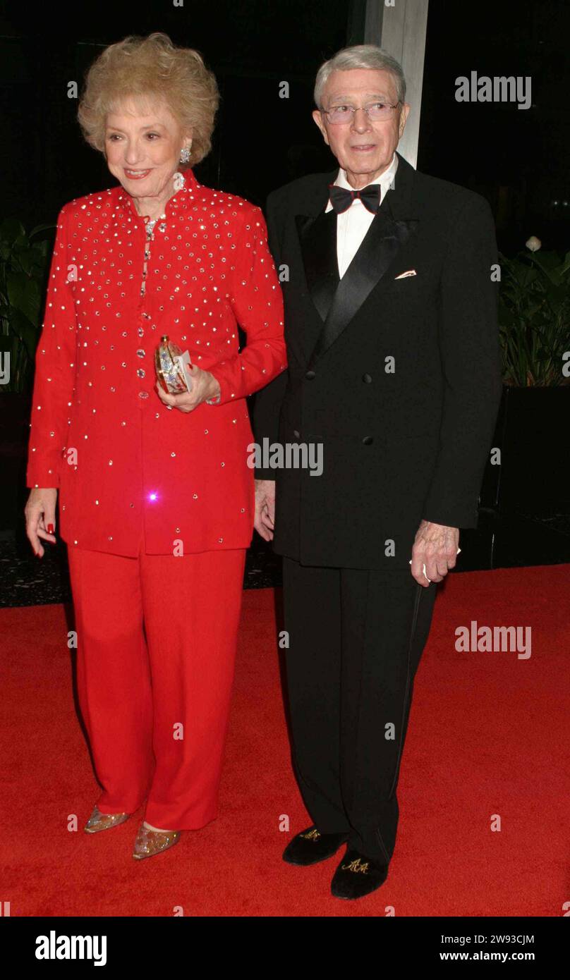 **FILE PHOTO** Selma Archerd Has Passed Away. Army Archerd and wife Selma Archerd attend the Kennedy Center Honors Trustees Dinner at the Department of State in Washington, DC on December 4, 2004. Photo Credit: Henry McGee/MediaPunch Credit: MediaPunch Inc/Alamy Live News Stock Photo