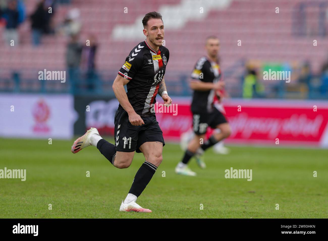 Szymon Kobusinski seen in action during Fortuna 1 Polish League 2023/2024 football match between Wisla Krakow and Polonia Warszawa at Krakow Municipal Stadium. Final score; Wisla Krakow 2:1 Polonia Warszawa. (Photo by Grzegorz Wajda/SOPA Images/Sipa USA) Credit: Sipa USA/Alamy Live News Stock Photo