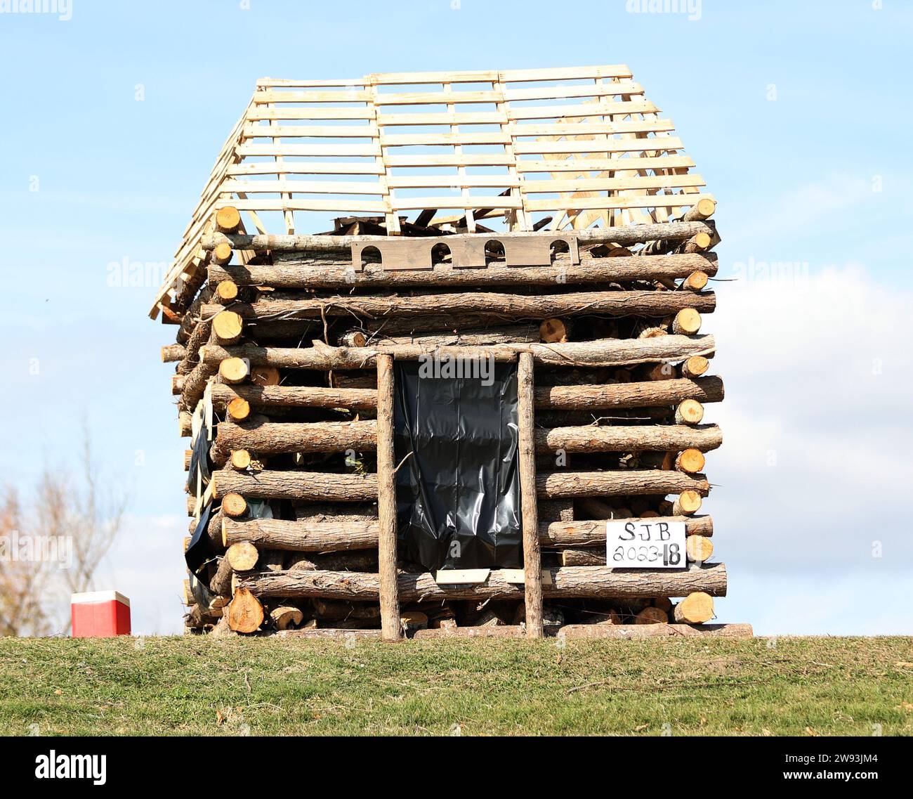 Reserve, USA. 23rd Dec, 2023. A bonfire built like a Church is on display at the River Road in Edgard, Louisiana on Saturday, December 23, 2023. (Photo by Peter G. Forest/Sipa USA) Credit: Sipa USA/Alamy Live News Stock Photo