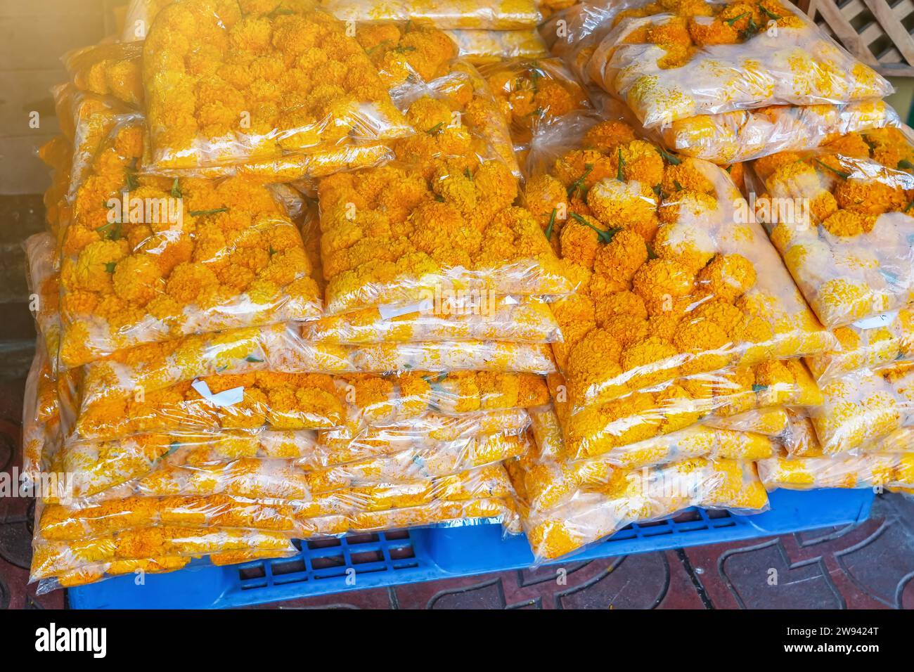 Flower market in Thailand, group of marigold bag sale at market Stock Photo