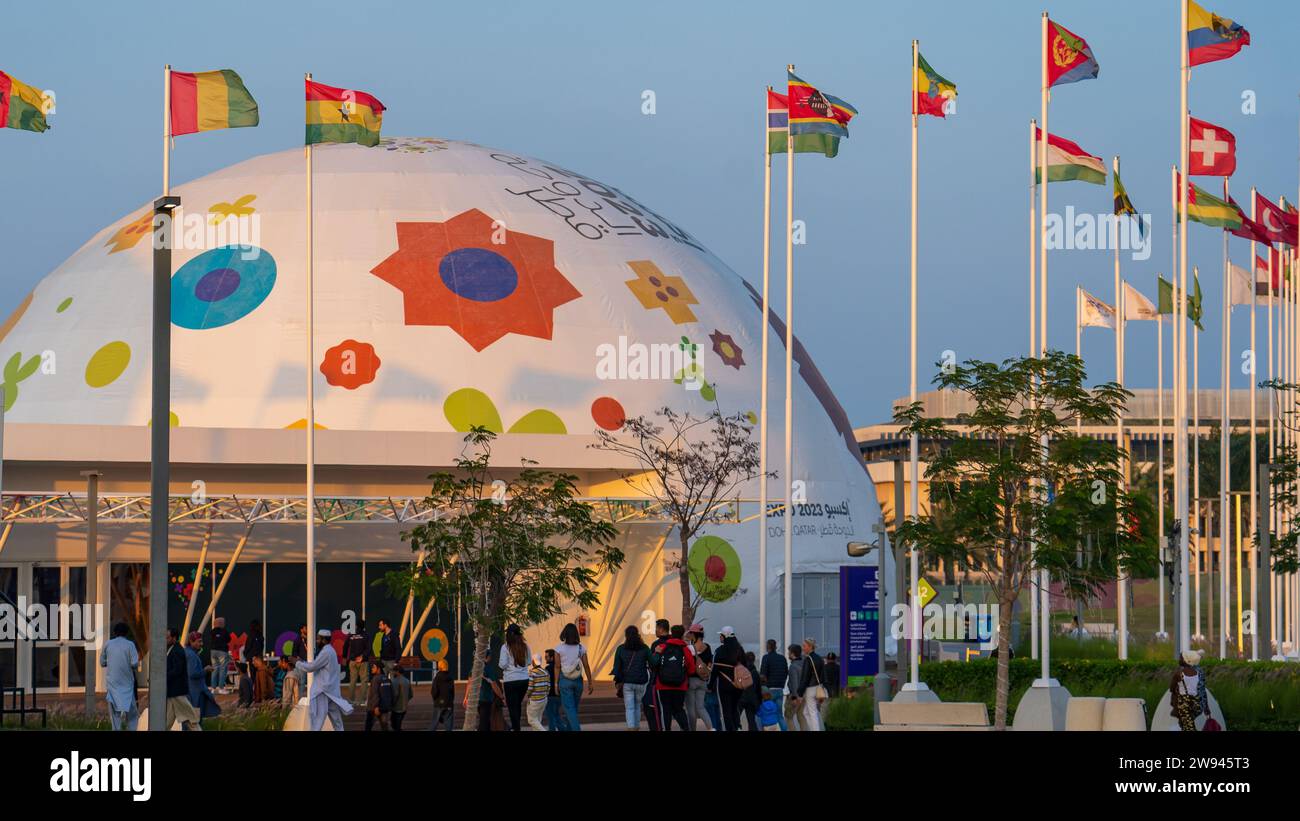 Doha, Qatar- December 12, 2023 : multiple people visiting qatar expo pavilions Stock Photo