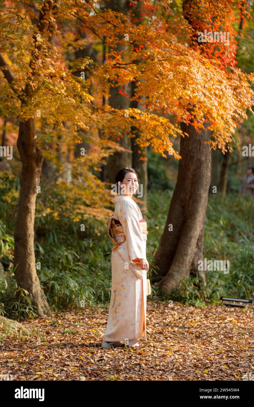 Japanese Female Kimono Portrait photography. Kyoto, Japan. Maple leaves