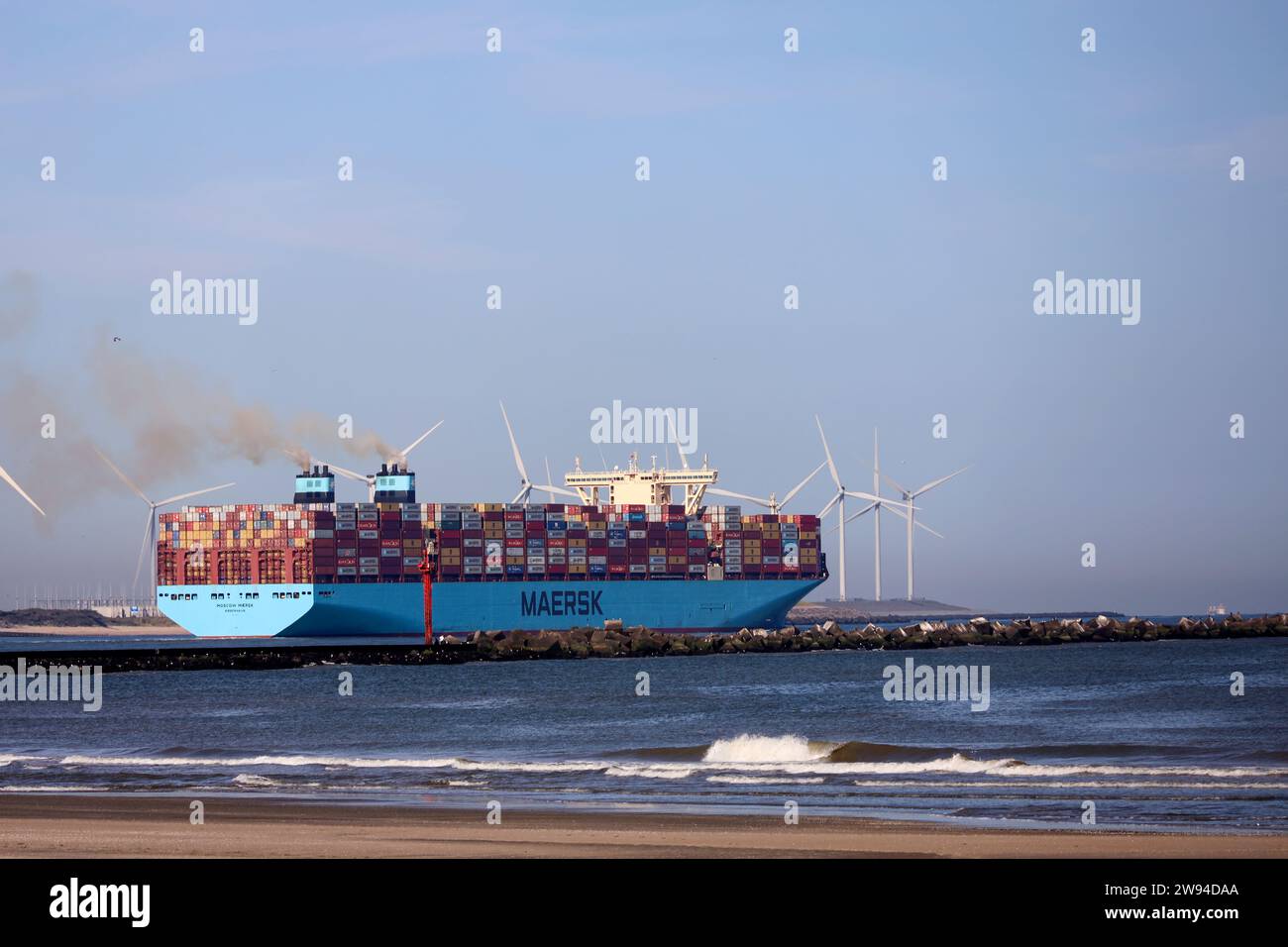 Container ship Moscow Maersk is leaving Maasvlakte harbor in the Port of Rotterdam in Netherlands Stock Photo