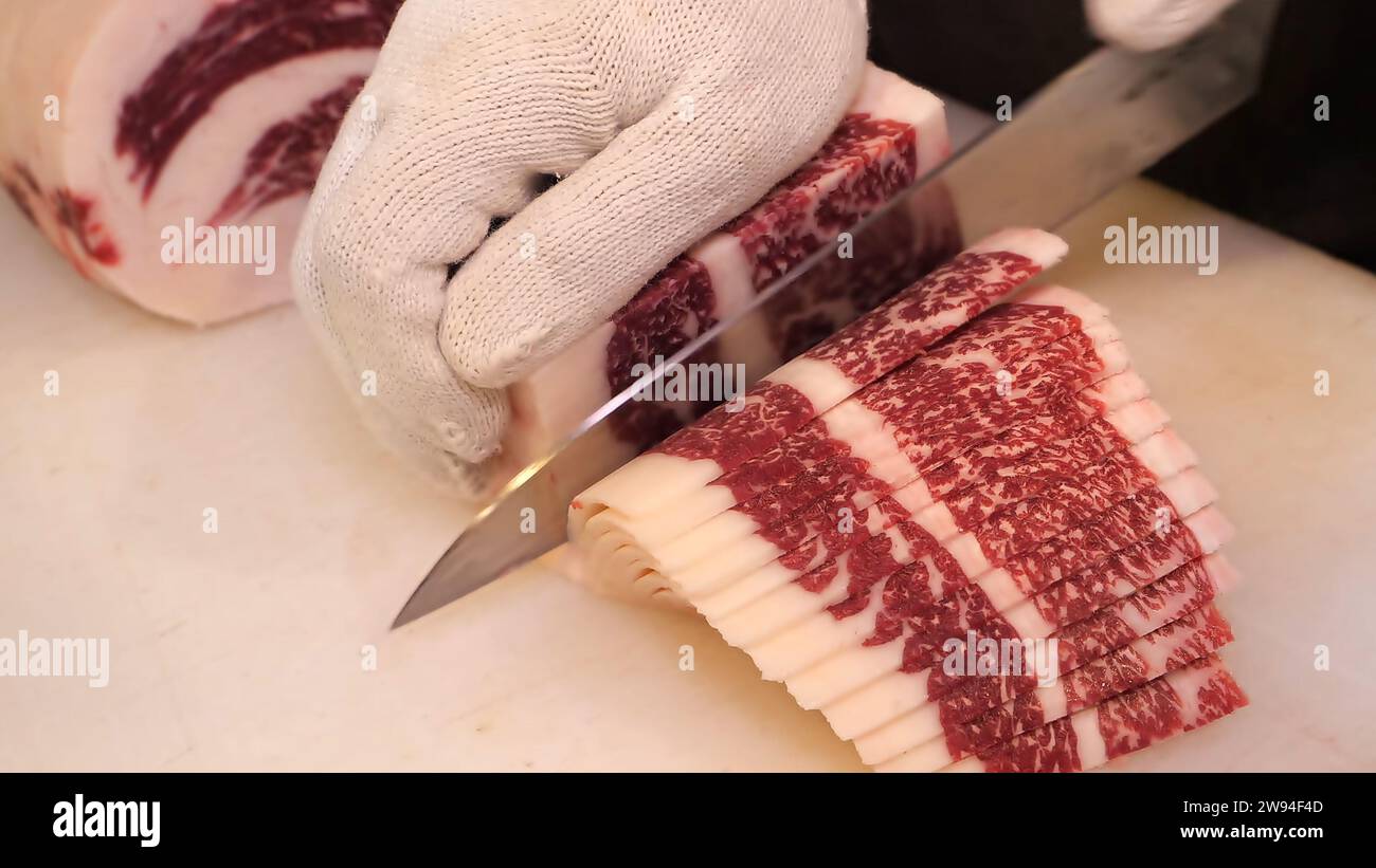 Premium Beef cuts Skilled chef carving premium beef cuts with