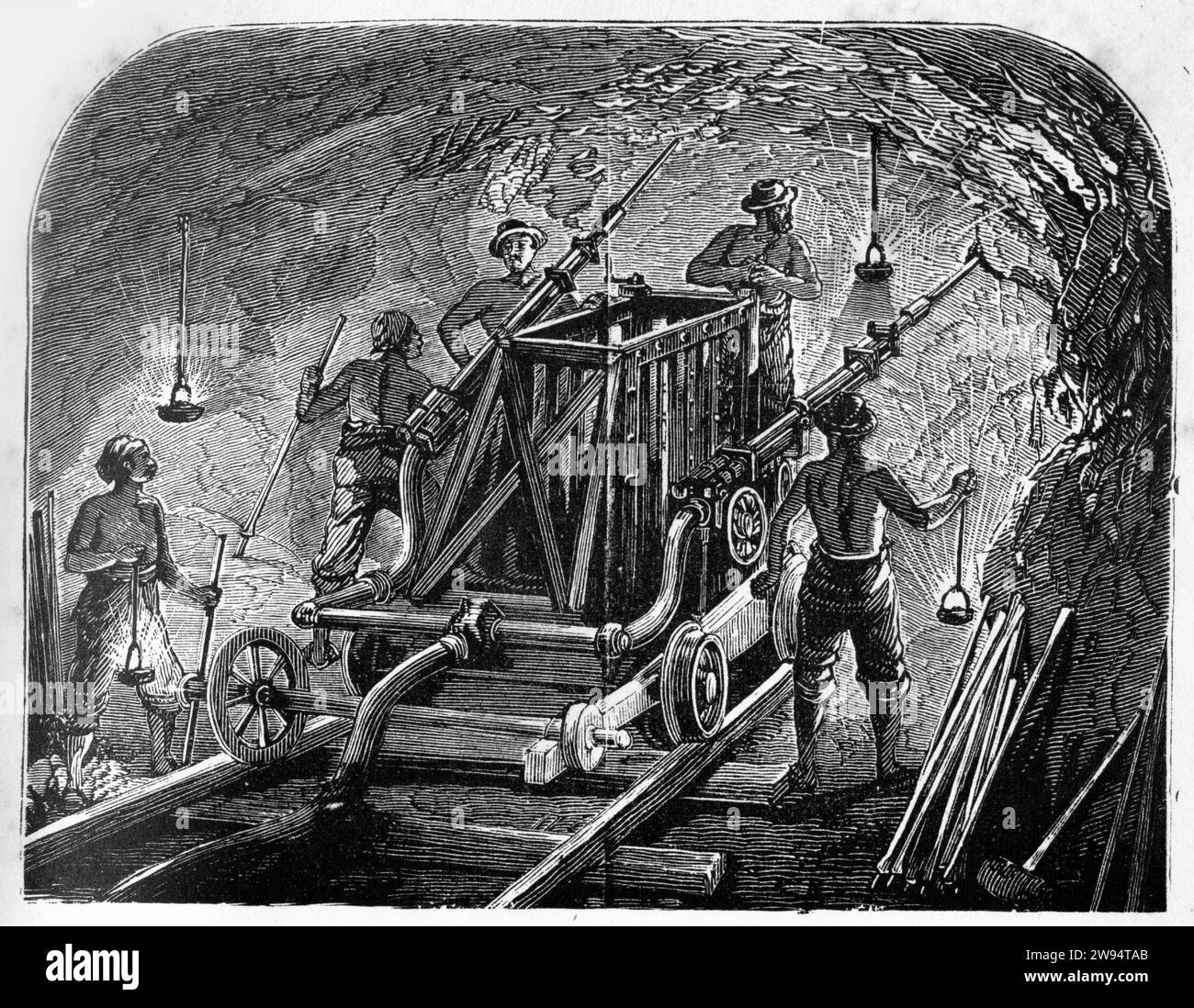 Engraving of a boring machine in Cenis tunnel that links Italy and France, from The Underground World, circa 1878 Stock Photo