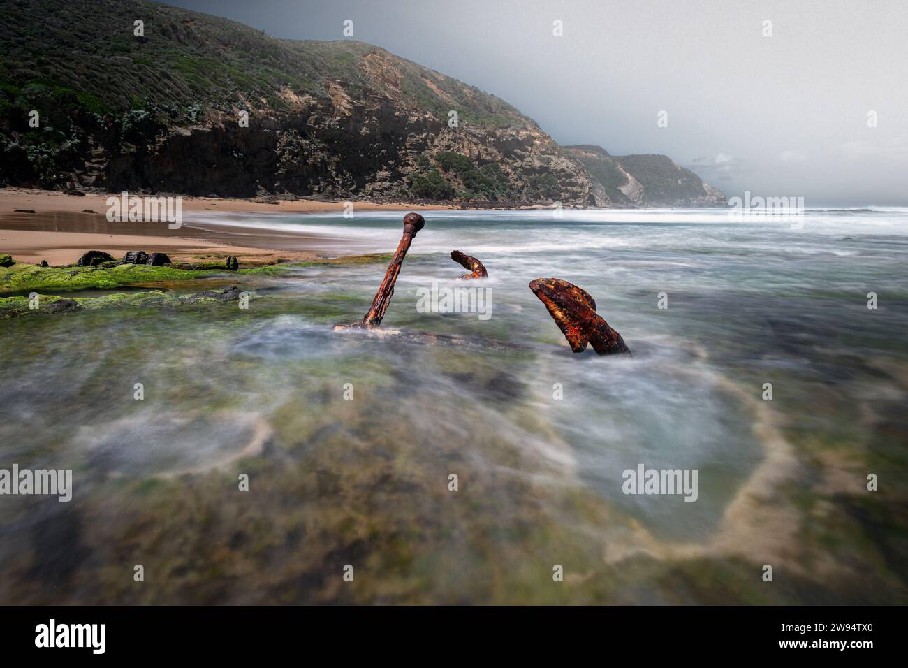 Rusty anchor at Wreck Beach along the famous Great Ocean Road. Stock Photo